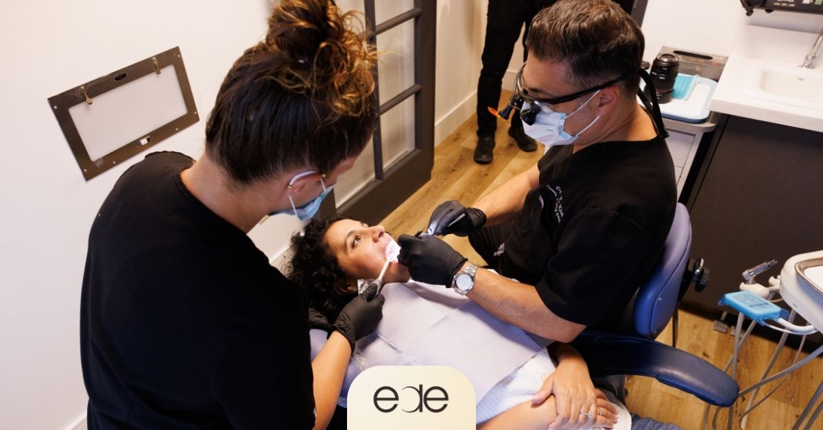 Dr. Kiai and a dental assistant providing root canal treatment to a patient at Encino Dental Esthetics.